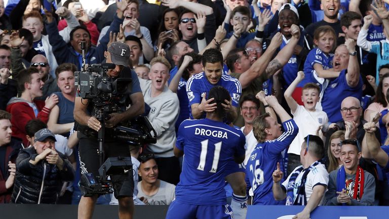 Eden Hazard celebrates scoring with Didier Drogba