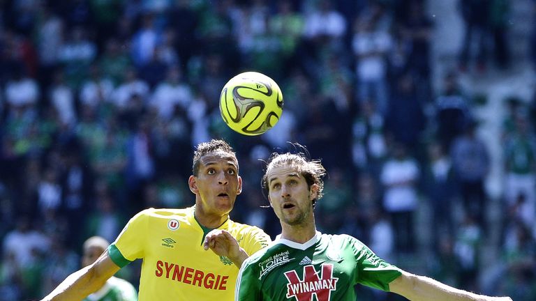 Saint-Etienne's French defender Francois Clerc (R) vies with Nantes' French forward Yacine Bammou (L) during the French L1 football match