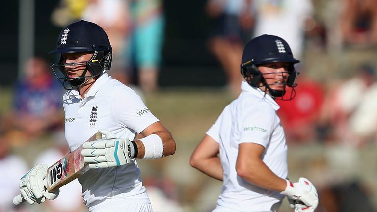 Gary Ballance (R) and Joe Root (L) of  England build a partnership during day three of the 1st Test match