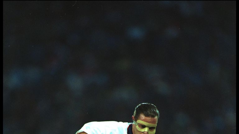 8 SEP 1993:  PAUL GASCOIGNE OF ENGLAND WEARING HIS PROTECTIVE MASK CONTROLS THE BALL DURING A WORLD CUP QUALIFYING MATCH AGAINST POLAND PLAYED IN KATOWICE.