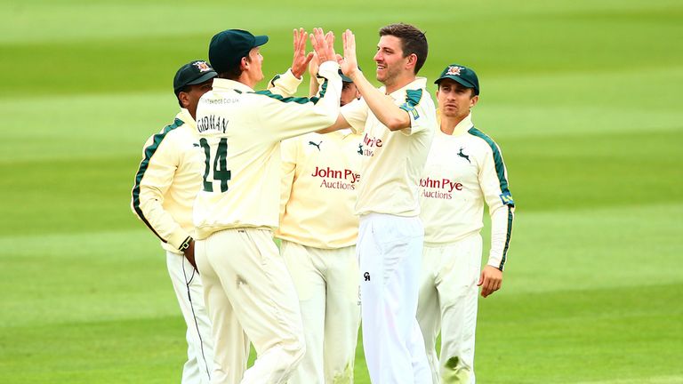 Nottinghamshire celebrate with Harry Gurney after he bowls out Nick Gubbins