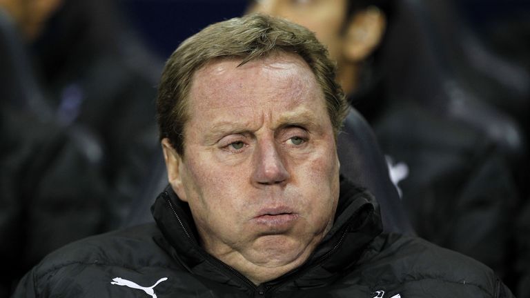 Tottenham Hotspur's English manager Harry Redknapp looks on before the English Premier League football match between Tottenham Hotspur and Wigan Athletic a