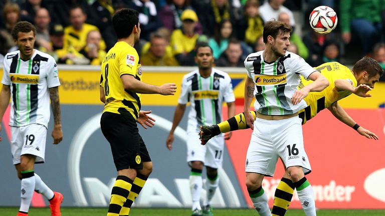 MOENCHENGLADBACH, GERMANY - APRIL 11: (L-R) Harvard Nordtveit of Moenchengladbach and Sebastian 