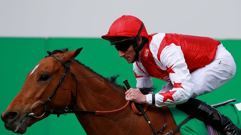 Custom Cut ridden by Daniel Udhope on their way to victory in the bet365 Mile during bet365 Friday at Sandown Racecourse, Surrey. PRESS ASSOCIATION Photo. 