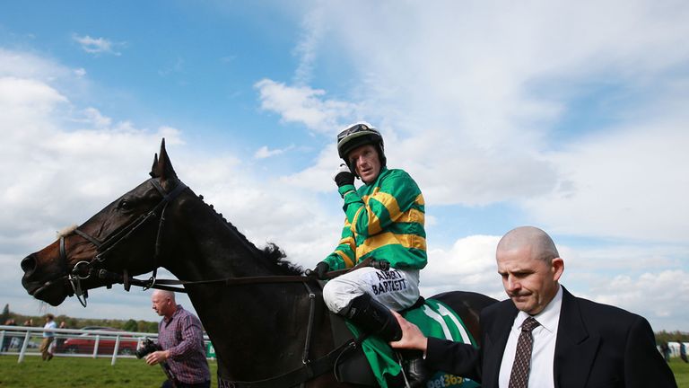 Tony McCoy on Box Office as he becomes emotional following his last race, the bet365 Handicap Hurdle during the bet365 Jump Finale at Sandown Racecourse, S