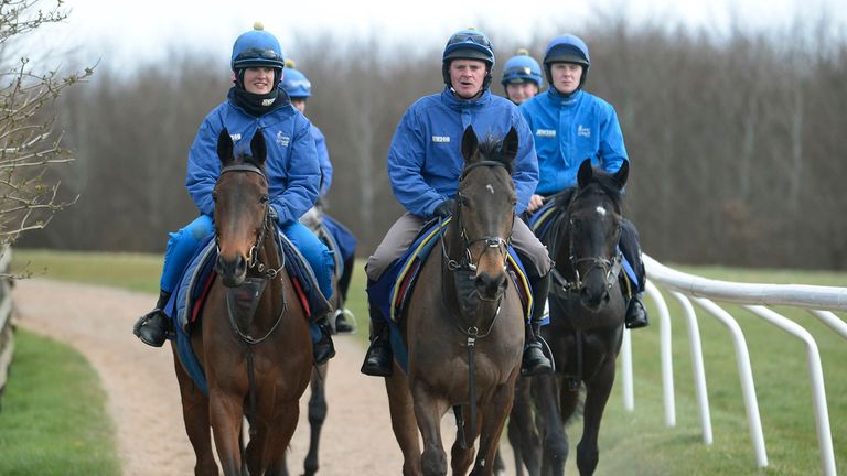 Holywell ridden by stable lass Kate Hanson (left) is also heading to the great Liverpool meeting