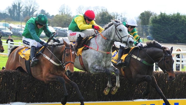 Gilgamboa ridden by Tony McCoy (right) jumps the last to win the Ryanair Gold Cup during Ryanair Gold Cup Day at Fairyhouse Racecourse, Ratoath, Ireland. P