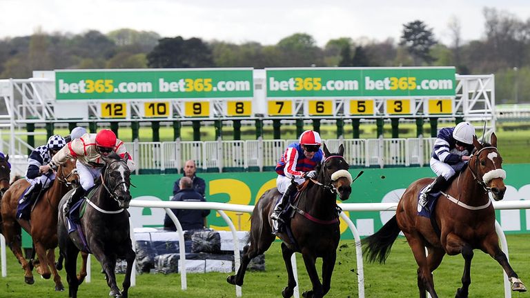 Corona Borealis and Paul Mulrennan (second right) go on to win the bet365 Handicap Stakes during the bet365 Inaugral Flat Meeting at Wetherby