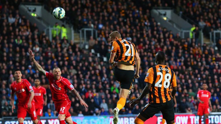 Michael Dawson of Hull City (21) scores their first goal during the Barclays Premier League match between Hull City and Liverpool