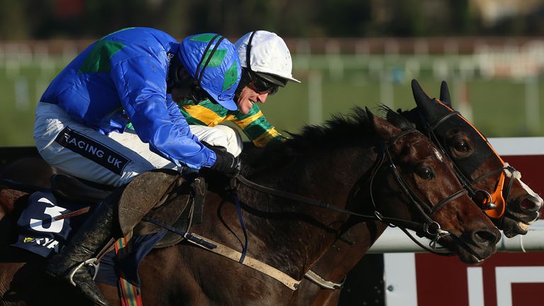 Hurricane Fly (left) ridden by Ruby Walsh alongside Jezki and Tony McCoy