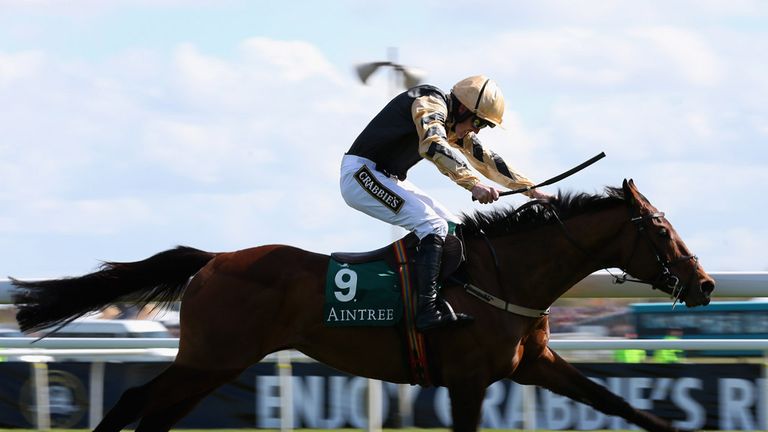 Nichols Canyon ridden by Ruby Walsh sprints for the line to win The World Famous Just Eat Mersey Novices' Hurdle