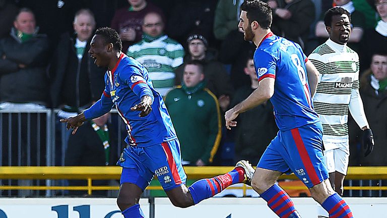 Inverness' Edward Ofere (left) charges off to celebrate his goal against Celtic