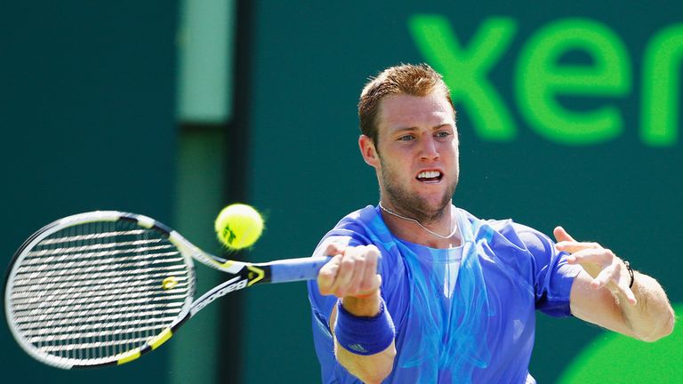 Jack Sock returns the ball against Go Soeda of Japan during day 3 of the Miami Open at Crandon Park Tennis Center on March 25
