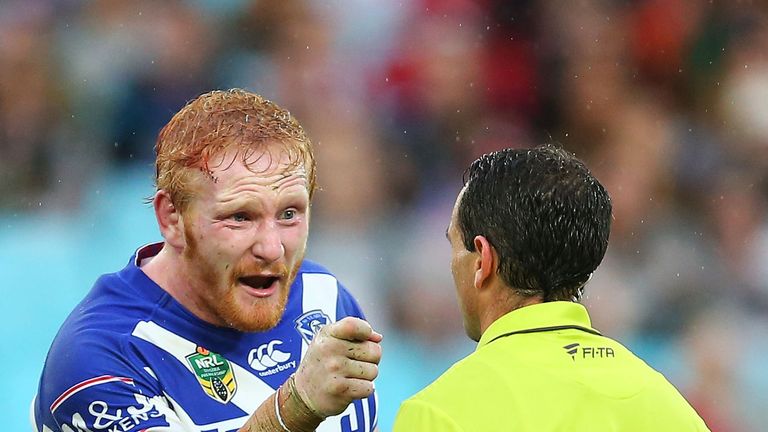 James Graham of the Bulldogs confronts referee Gerard Sutton