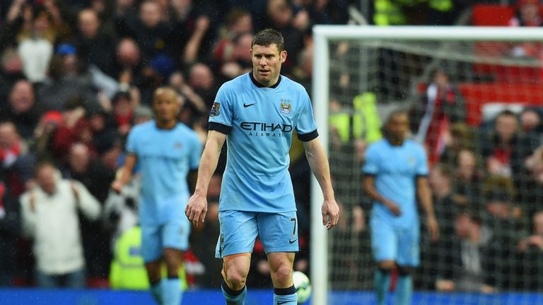 MANCHESTER, ENGLAND - APRIL 12:  James Milner of Manchester City looks dejected during the Barclays Premier League match between Manchester United and Manc