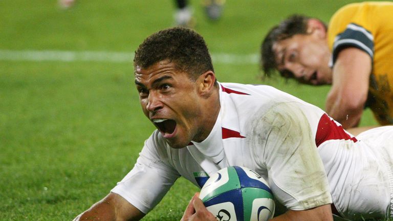 Jason Robinson celebrates scoring his try for England against Australia during the Rugby World Cup Final at the Telstra Stadium, Sydney, Australia.