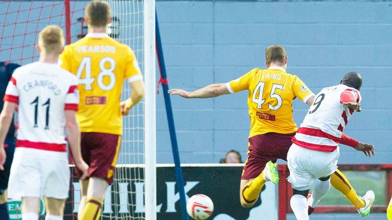 Jason Scotland scores the first goal in Hamilton's win over Motherwell