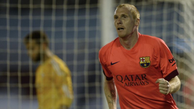 Jeremy Mathieu celebrates Barcelona's winner