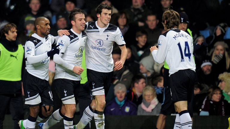 Jermain Defoe, Rafael Van Der Vaart, Gareth Bale and Luka Modric of Tottenham celebrate after Van Der Vaart scores