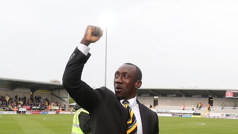 Burton Albion manager Jimmy Floyd Hasselbaink salutes the crowd after their final home game