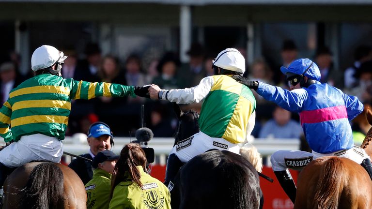 Leighton Aspell (C) is congratulated by Tony McCoy (L) and Paul Moloney 