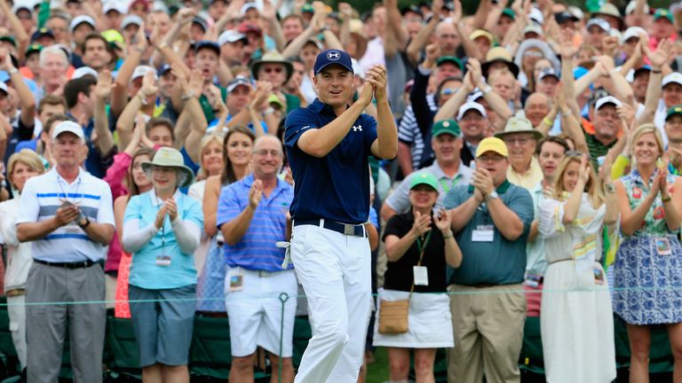 AUGUSTA, GA - APRIL 12:  Patrons cheer for Jordan Spieth of the United States on the 18th green after his four-stroke victory at the 2015 Masters Tournamen