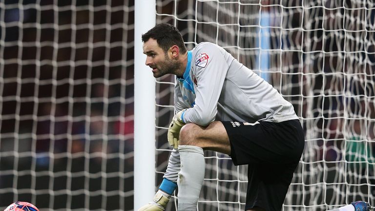 Blackpool's Joe Lewis: Had to wear a signed jersey against Reading last week