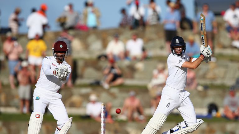 ANTIGUA, ANTIGUA AND BARBUDA - APRIL 15: Joe Root of England plays to the offside as wicketkeeper Denesh Ramdin of West Indies