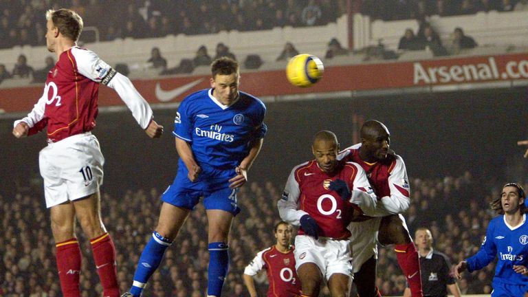 Chelsea's John Terry eludes Arsenal's Dennis Bergkamp, Thierry Henry and Sol Campbell to equalise at Highbury in December 2004