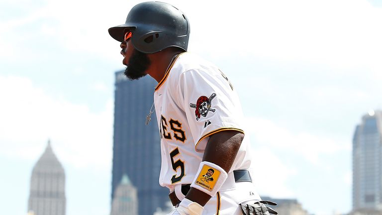 Josh Harrison of Pittsburgh Pirates celebrates a solo home run against Detroit Tigers on Monday
