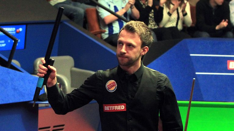 Judd Trump celebrates beating Marco Fu during day ten of the Betfred World Championships at the Crucible Theatre, Sheffield. PRESS ASSOCIATION Photo. Pictu