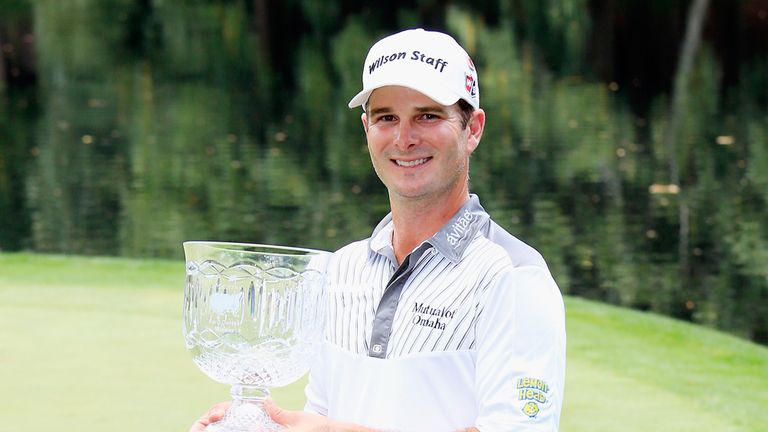 AUGUSTA, GA - APRIL 08: Kevin Streelman of the United States celebrates with the trophy after winning the Par 3 Contest prior to the start of the 2015 Mast