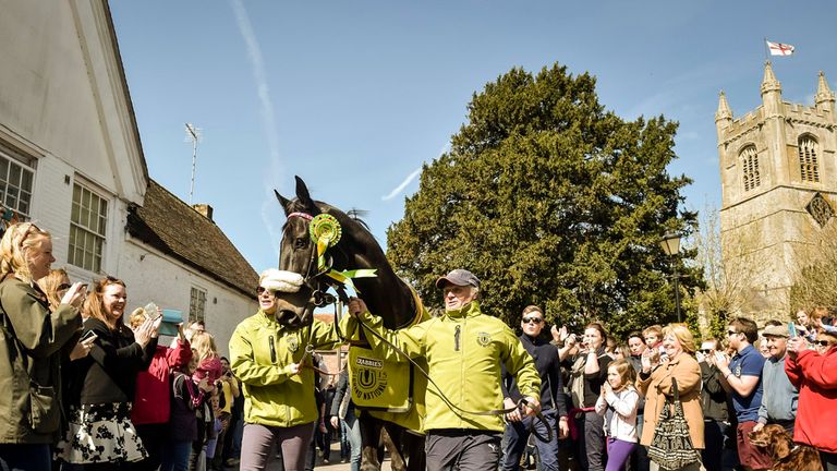 Many Clouds is cheered by hundreds of people to celebrate winning the Crabbies Grand National
