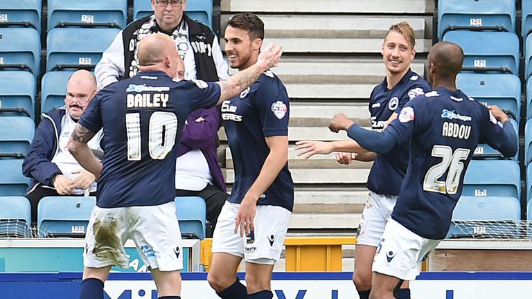 Lee Gregory (2nd L) of Millwall celebrates his goal during the Sky Bet Championship match between Millwall and Derby County