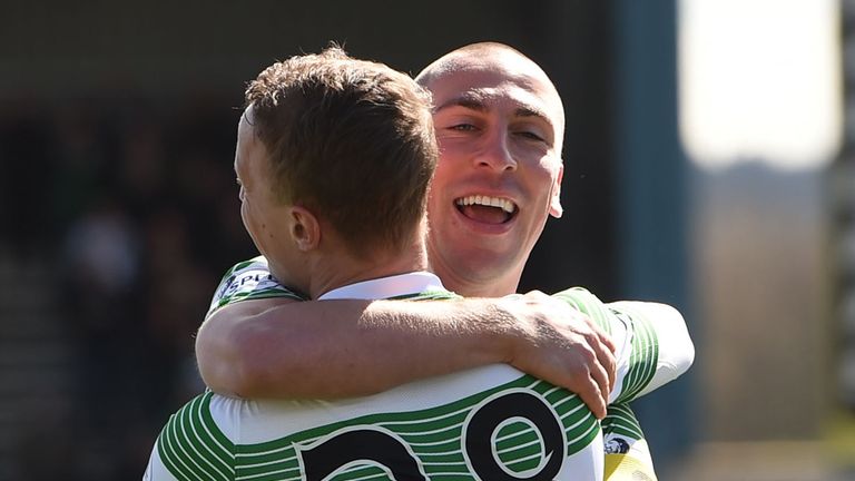 Leigh Griffiths celebrates his goal with Celtic captain Scott Brown (right)