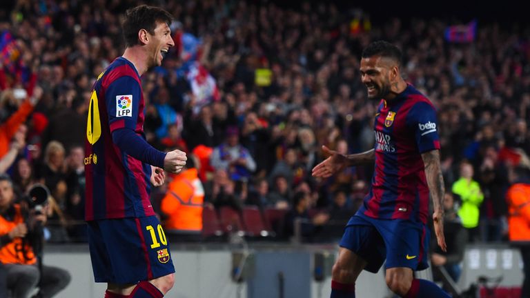 Lionel Messi celebrates after scoring for Barcelona against Almeria