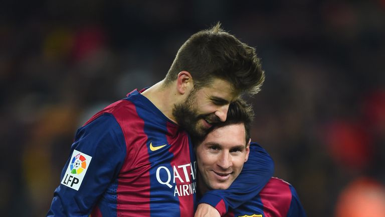 BARCELONA, SPAIN - MARCH 22:  Gerard Pique and Lionel Messi of Barcelona celebrate victory after the La Liga match between FC Barcelona and Real Madrid CF 