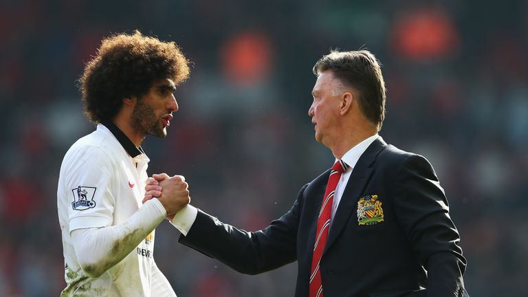 Louis van Gaal celebrates with Marouane Fellaini after Manchester United's win over Liverpool at Anfield, March 2015