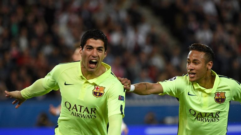 Luis Suarez celebrates with Neymar