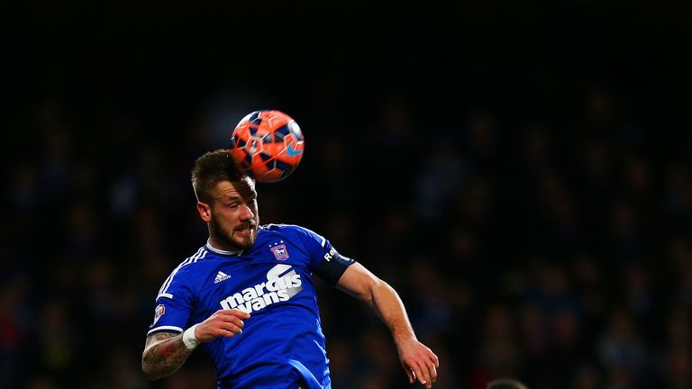 Luke Chambers of Ipswich heads the ball during the FA Cup third round replay match between Ipswich Town and Southampton