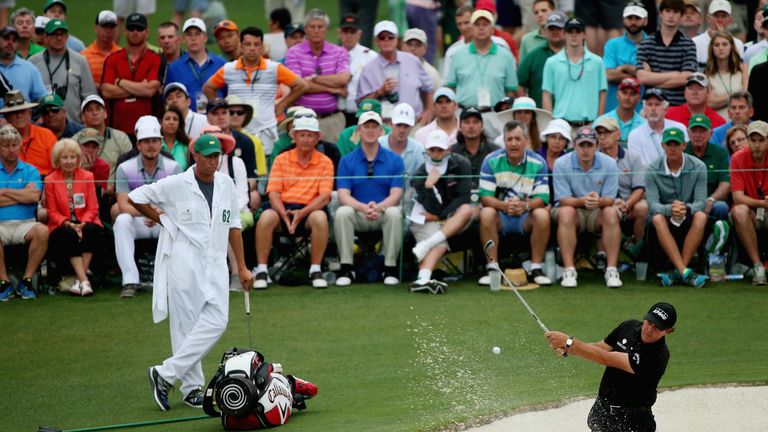 Phil Mickelson plays a bunker shot on the 15th hole during the final round of the 2015 Masters Tournament at Augusta on April 12, 2015