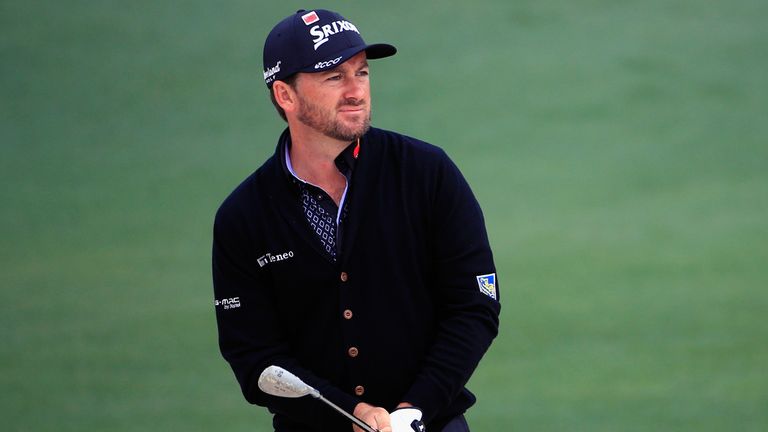 Graeme McDowell of Northern Ireland hits a shot from a bunker during a practice round prior to the start of the 2015 Masters