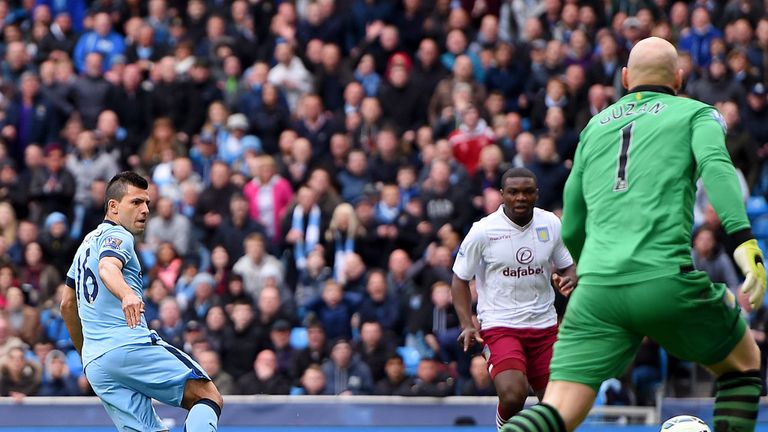 Manchester City's Sergio Aguero (left) pounces on a mistake by Aston Villa goalkeeper Brad Guzan to score his side's first goal