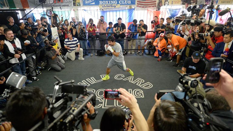 Manny Pacquiao spars during a workout in preparation for his fight against Floyd Mayweather Jr. at Wild Card Boxing Club.