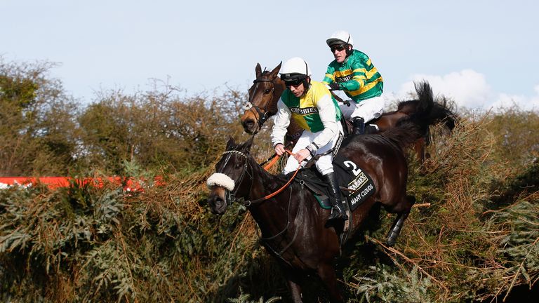 Many Clouds ridden by Leighton Aspell on his way to winning the 2015 Crabbie's Grand National at Aintree Racecourse