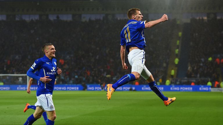 Marc Albrighton of Leicester City (R) celebrates scoring the opening goal during the Barclays Premier League match between 
