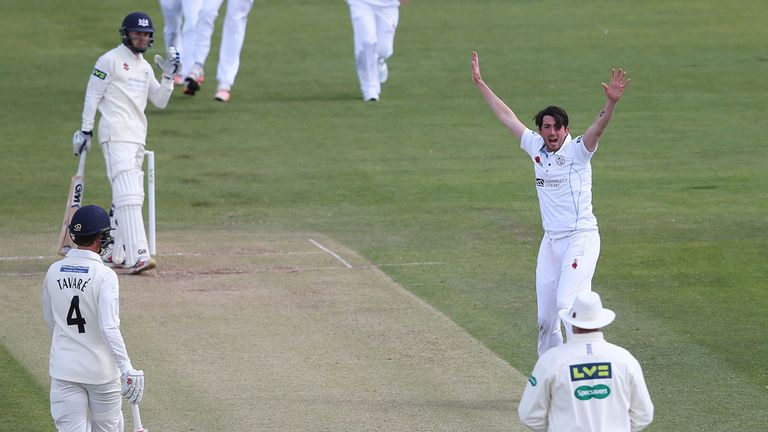 Gloucestershire's Chris Dent is dismissed by Derbyshire's Mark Footitt for 2 during the LV= County Championship match