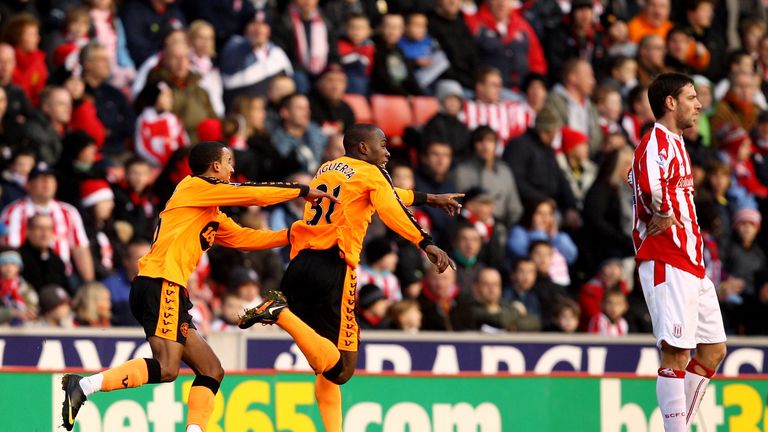 Maynor Figueroa of Wigan celebrates scoring a long range goal during the Barclays Premier League match against Stoke in 2009