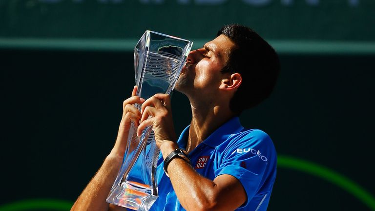Novak Djokovic celebrates with the Miami Open trophy
