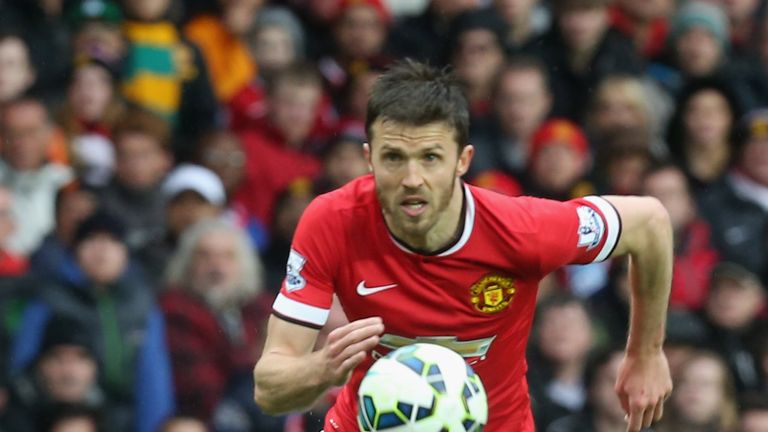 Michael Carrick of Manchester United in action during the  Premier League match between Man United and Man City at Old Trafford on April 12, 2015 